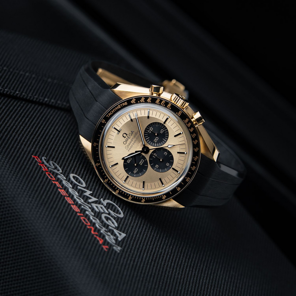 Omega Speedmaster UNWORN 5/2026 Moonwatch Pikachu Yellow Gold Chronograph 42mm 310.62.42.50.99.001